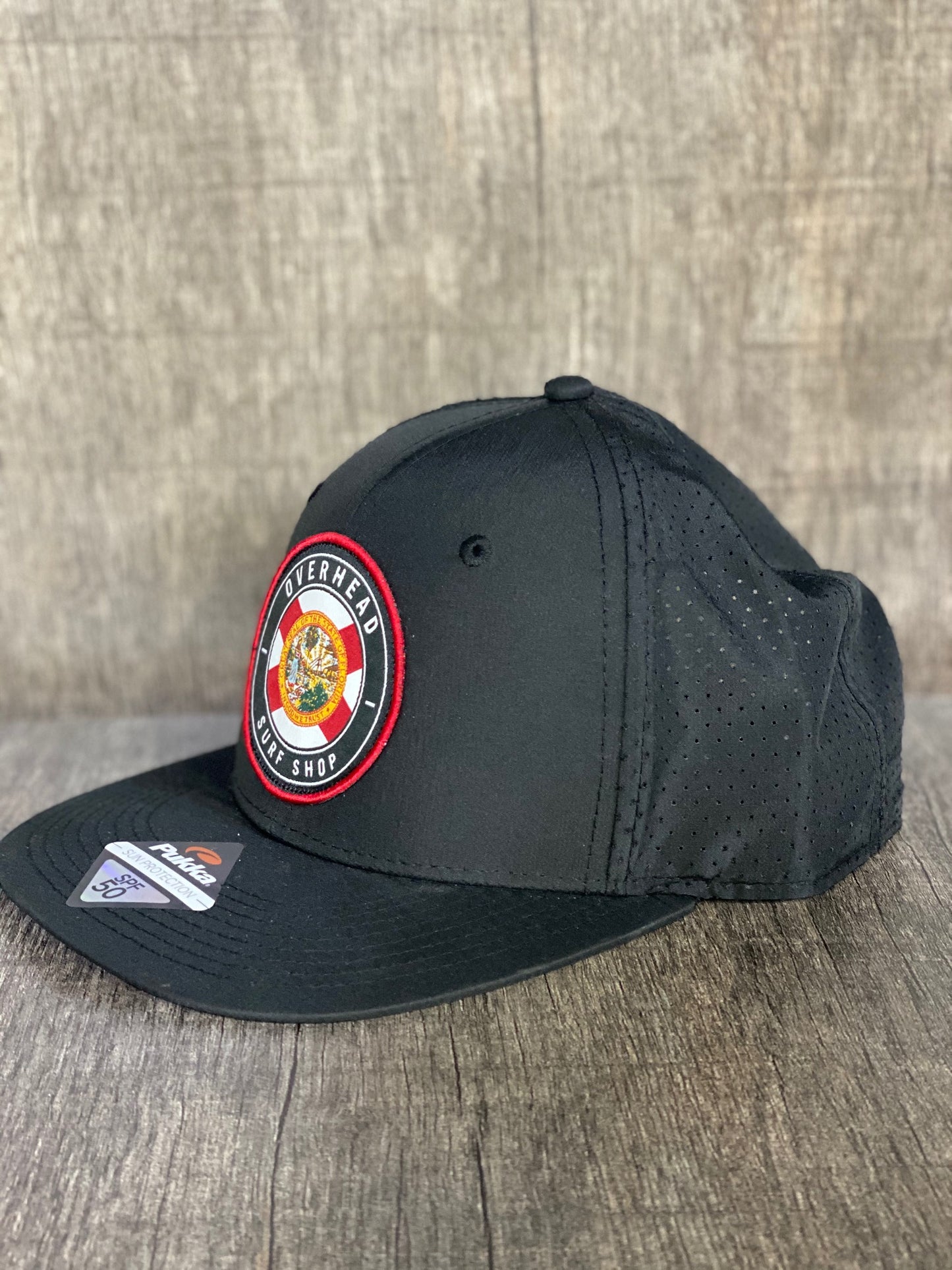 Round Flag Performance Trucker in Black