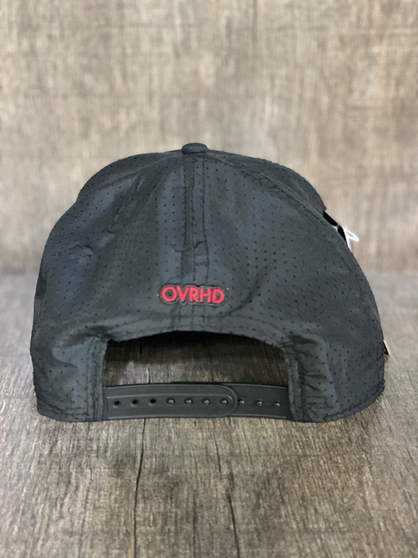 Round Flag Performance Trucker in Black