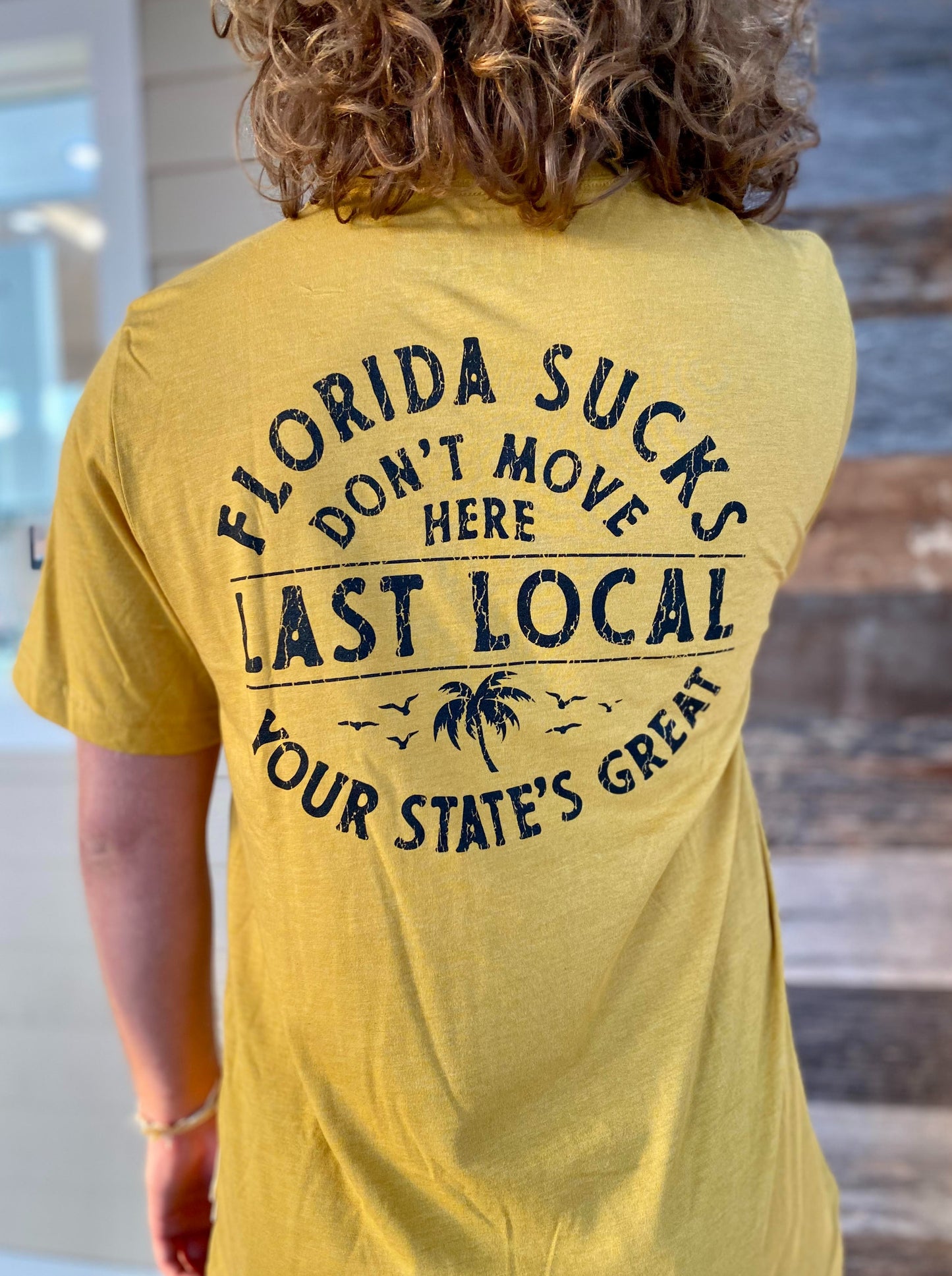 Florida Sucks Tee - Gold